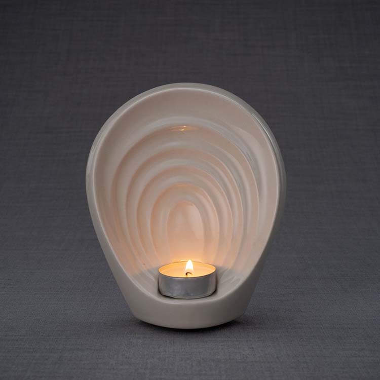 https://grafdecoratie.nl/photos/keramische-mini-art-urn-Guardian-crematie-as-miniurnen-keramiek-GU-S02.JPG