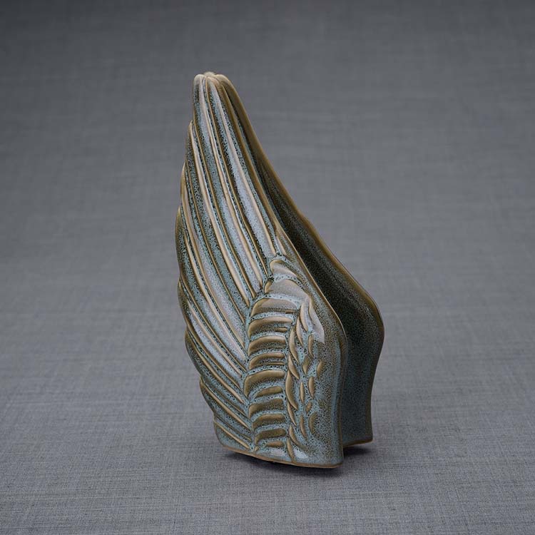 https://grafdecoratie.nl/photos/keramische-mini-art-urn-Wings-crematie-as-urnen-keramiek-WI-S11.JPG