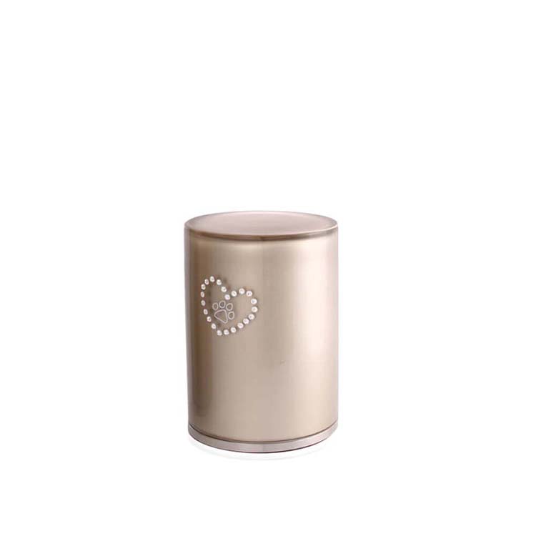https://grafdecoratie.nl/photos/klein-glazen-crematie-as-cilinder-urn-Cappuccino-pootje-hart-GUP061S-urnwebshop.jpg